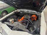 a car that has a engine in the trunk of it