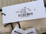 an image of a label on the back of a sweater