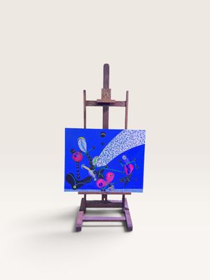 chevalet d'artiste avec une peinture représentant un oiseau sur fond bleu