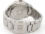 an image of a close up of a wrist watch on a white surface