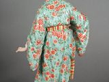 an image of a figurine of a woman in a kimono