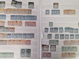 many different stamps on the pages of a book