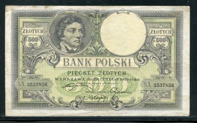 un gros plan d'un billet de banque sur lequel figure le portrait d'un homme