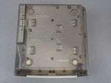 a metal box that has a clock inside of it