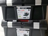 two tool boxes that are stacked on top of each other