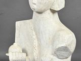 an image of a white sculpture of a woman holding a cup