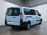 a white van that is parked in a room