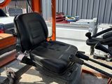 a black seat on the back of a small boat