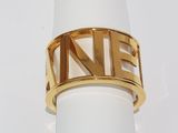an image of a gold ring with the letter n on it