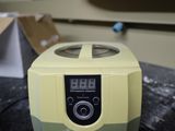 a small blender sitting on a counter in a kitchen