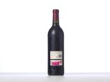 a bottle of wine that is sitting on a table