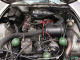 a car engine with a bunch of wires in it