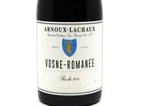 a bottle of wine that is sitting on a table
