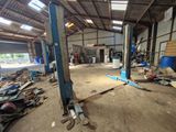 a large garage with a lot of tools in it