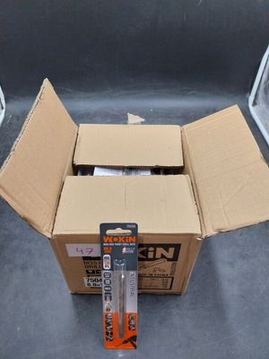 a cardboard box that is open on the ground