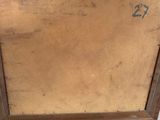a painting of a brown wooden frame sitting on top of a cement floor