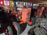 a tractor that is parked in a garage