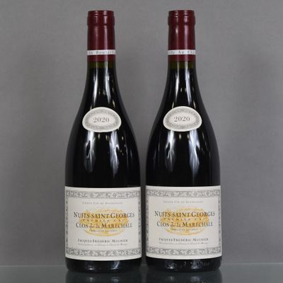 two bottles of wine sitting on top of a table next to each other