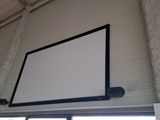 a picture of a picture of a large screen mounted to the ceiling