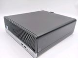 a close up of a computer on a white surface with a white background