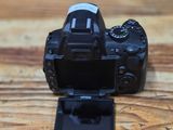 a camera that is sitting on a wooden table