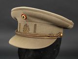 an image of a military hat with a red eye on it
