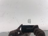 a man taking a picture of himself with his cell phone