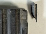 a close up of a piece of metal on a table