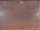 an old wooden box with a label on it
