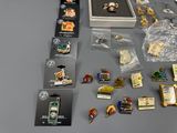 a lot of pins that are on a table