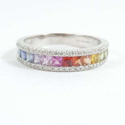 an image of a multicolored ring with diamonds