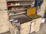 an old stove with a wooden cabinet in the middle of it
