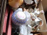 a box full of assorted figurines in it
