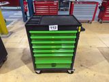 an image of a green and black tool cart in a garage