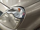 a close up of a car ' s headlight and tail light
