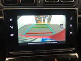 a picture of a car ' s rear view camera in the dash