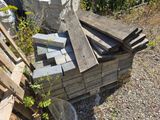 many pieces of wood stacked on top of each other