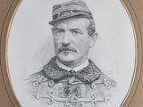 a black and white photo of a man in a military uniform