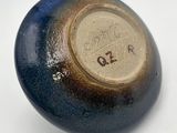 an image of a blue and brown ball with a number on it