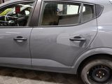 a small car that is parked in a showroom