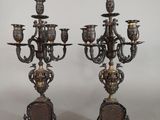 pair of antique brass candelabs with ornate design