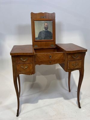 Coiffeuse en bois et placage marqueté ouvrant par trois abat…