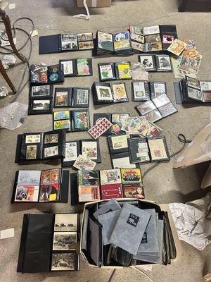 a lot of cds and cds in a box on the floor