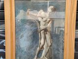 une photo d'un tableau représentant un homme tenant une croix
