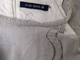 a close up of a shirt with a label on it