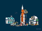 a lego space station with a rocket and a space shuttle