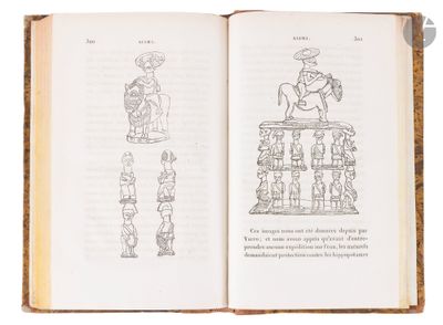 an open book with a drawing of a man on a horse on top of a table
