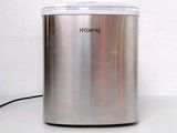 an image of a stainless steel container on a white surface
