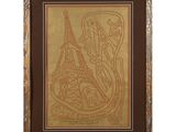 une photo encadrée de la tour Eiffel dans des tons dorés et marron