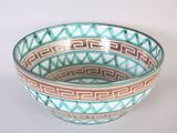 a bowl that is sitting on a white table